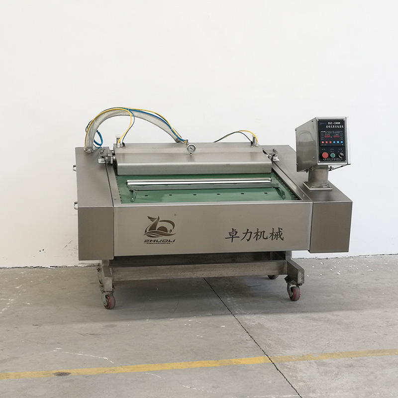 連續(xù)滾動式真空包裝機(jī) 連續(xù)滾動式真空包裝機(jī)